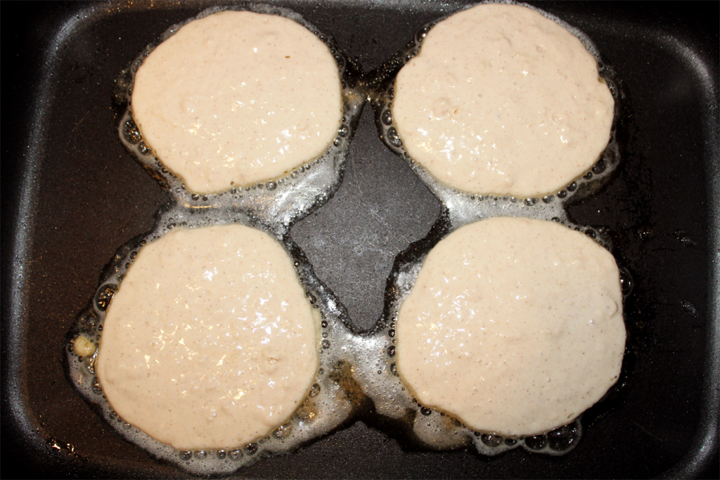 4 Crispy Edge Diner-style Pancakes on a griddle