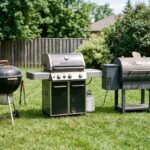 A charcoal, gas, and pellet grill in a backyard on a sunny day.