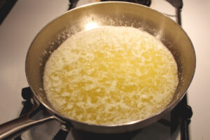 Butter beginning to brown in a pan on the stove