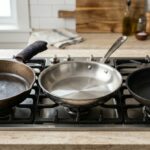 Cast Iron, Stainless Steel, and Nonstick Pans on a stovetop